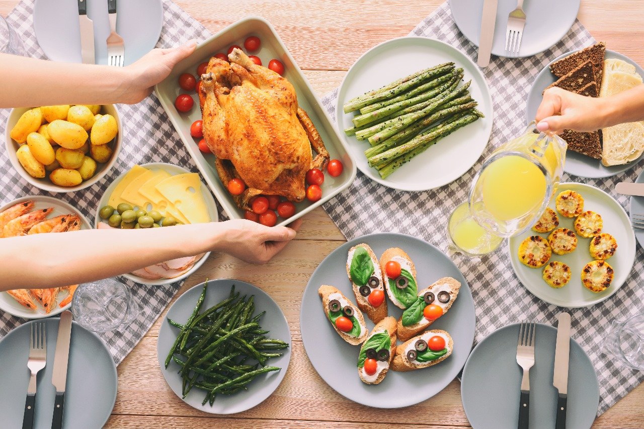 Family table with roast chicken